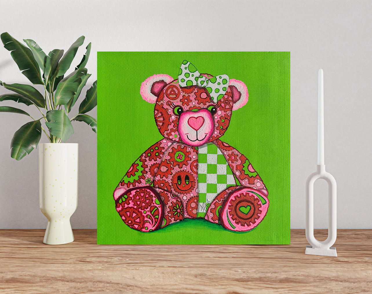 Meet "Lovey," the newest member of the GEAR BEAR family in the Doodle Gears collection! Lovey is a heartwarming bear painted in soft pinks, greens, & whites, covered in gears that turn together to symbolize love and hope. Just like the gears of life keep us moving forward, Lovey reminds us that love is the powerful force that makes the world go round. 

Whether you're searching for a little extra love or want to spread joy, Lovey is here to inspire &  uplift. Original Teddy Bear Nursery Pop Art Painting
